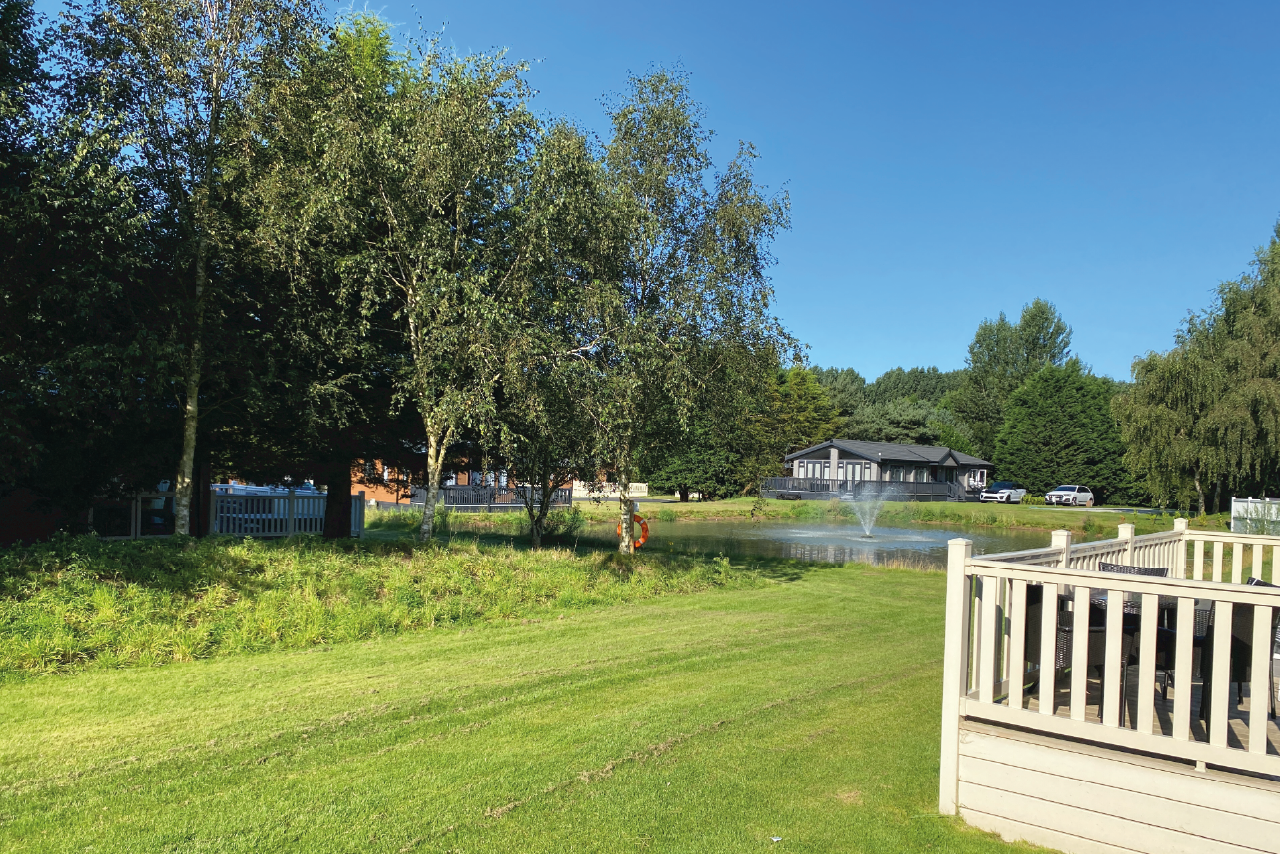 View of the lake at the Yorkshire burrow lodge with hot tub Yorkshire, Staycation holiday and family UK break